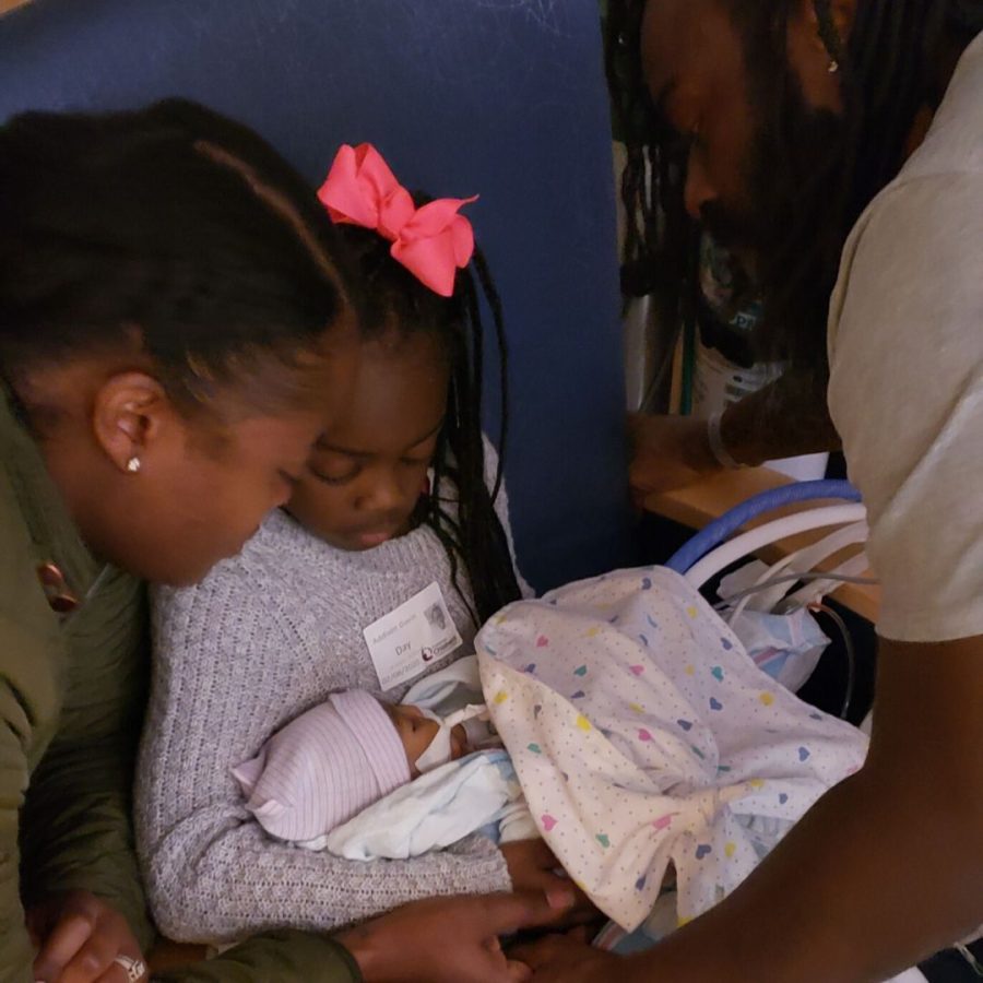 holding-baby-brother