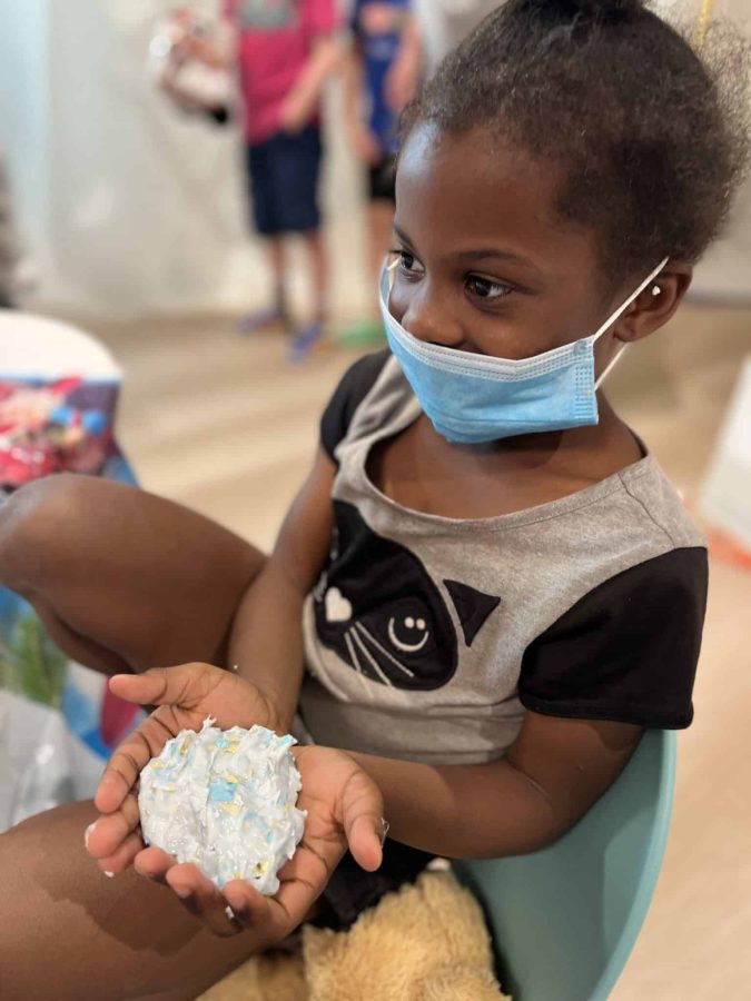 Image from Family Fun Nights - Kid holding a crafted art