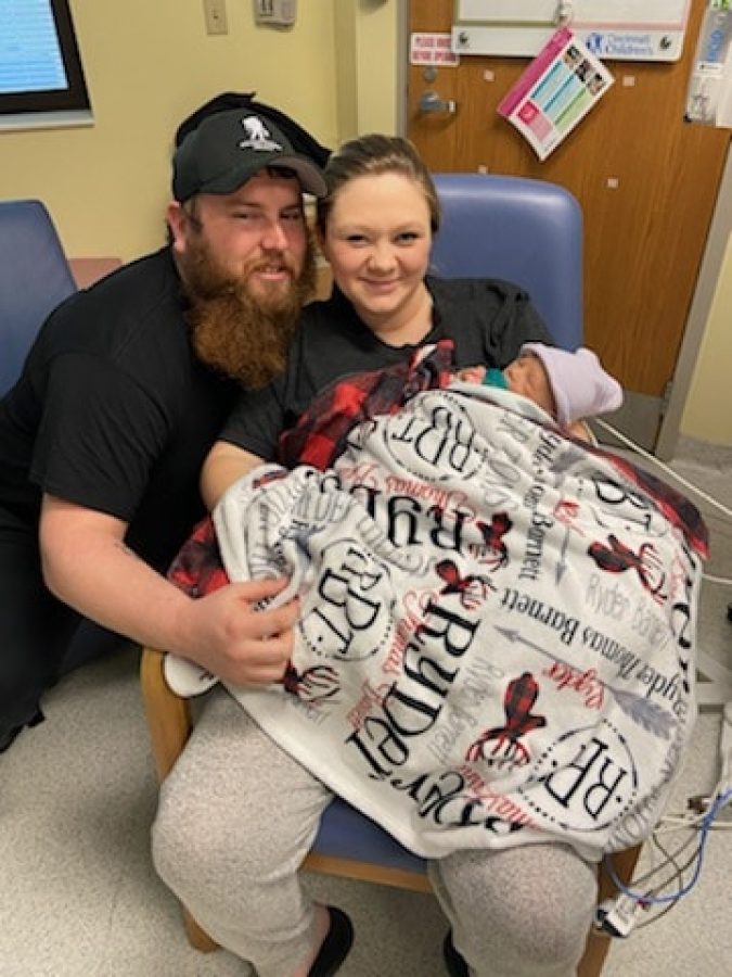 Image of Ryder with parents