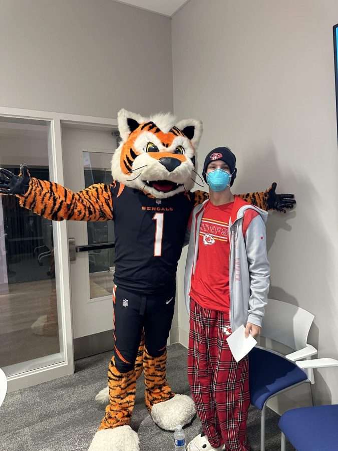 Image from Programs they love - Boy with the Bengals mascot