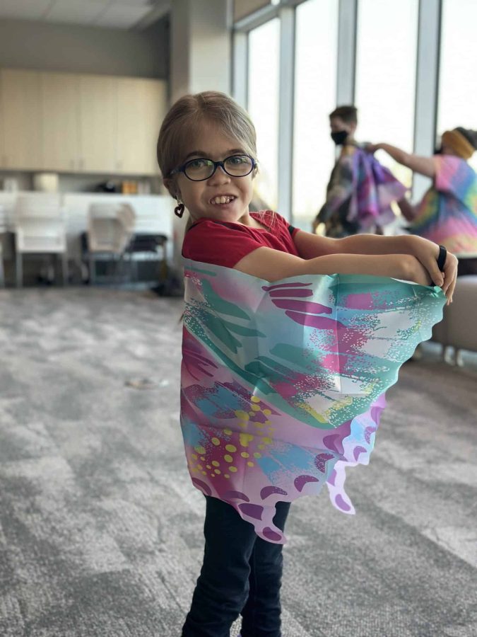 Image from Programs they love - Girl showing her butterfly wings