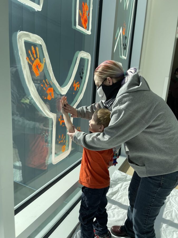 Image from Who Dey - Little boy and his mother in the hallway