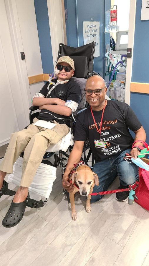 Image from Matthew's Moment - Group picture with Matthew and his dog