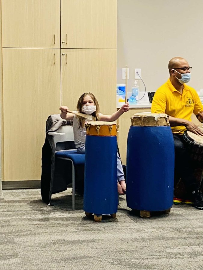 Image from Programs they love - Little girl playing conga