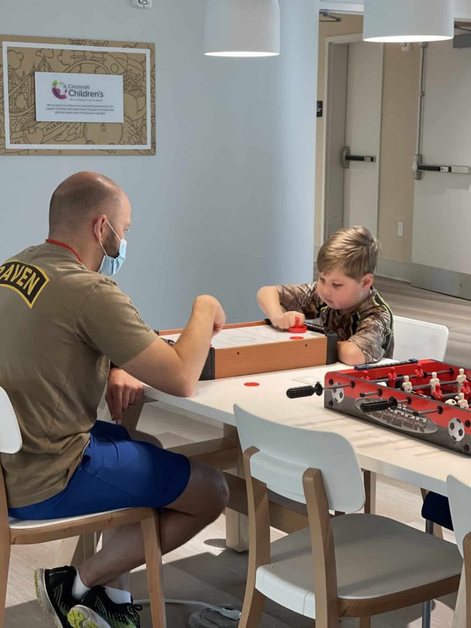 Image from Family Fun Nights - Playing air hockey