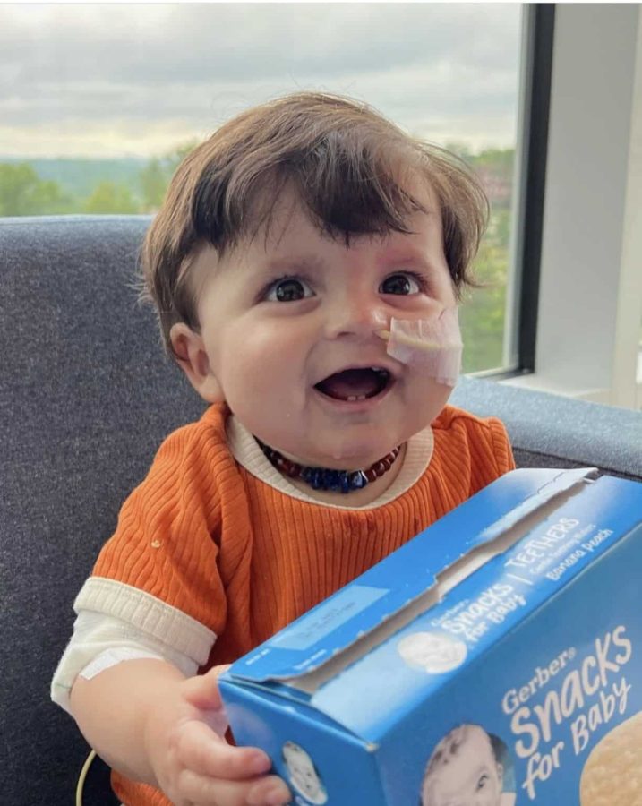 Image of Leo with Gerber snacks