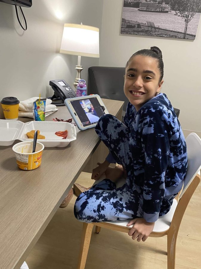 Image of Khloe with her tablet