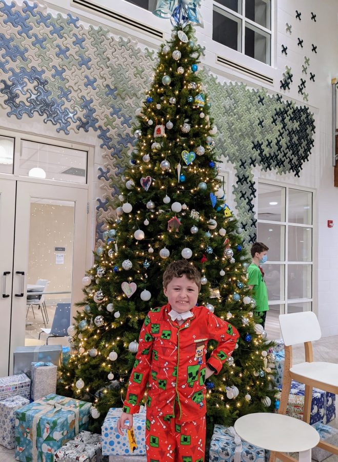 Image of Ash under a Christmas tree