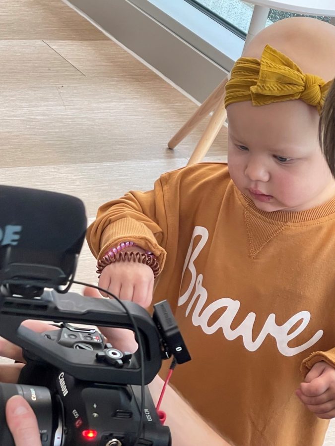 Image of Paisley looking at a camera