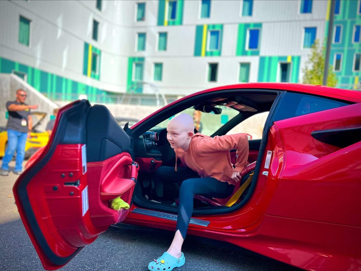 Image from Moments of Joy - Girl inside a red car
