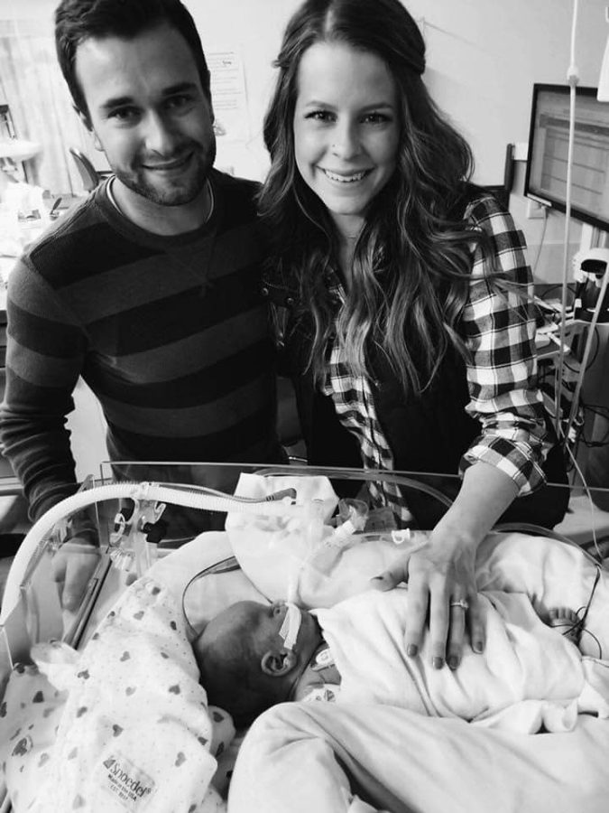 Image of Kasey with his parents